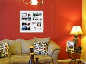 Mockup einer Wohnzimmerecke mit Couch in einem rot gestrichenen Raum mit auflockerndem Webslam-Arrangement im Rahmen und Passepartout